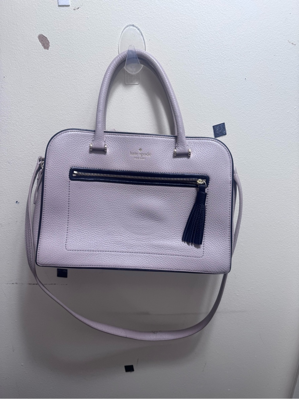 kate spade nude satchel with black tassel trim